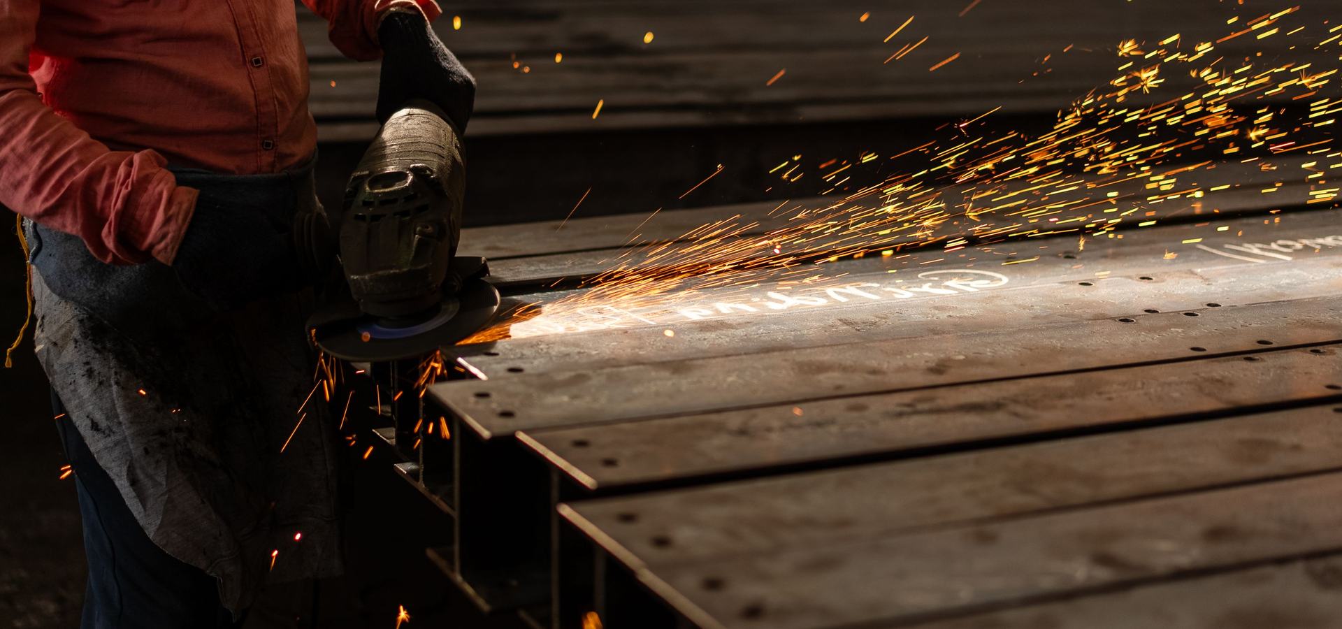 Grinding a fabricated steel assembly